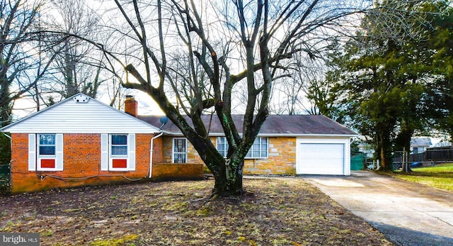 10903 Exeter Ct, Upper Marlboro, MD 20774 - view of front of home with a chimney, driveway, an attached garage, and brick siding