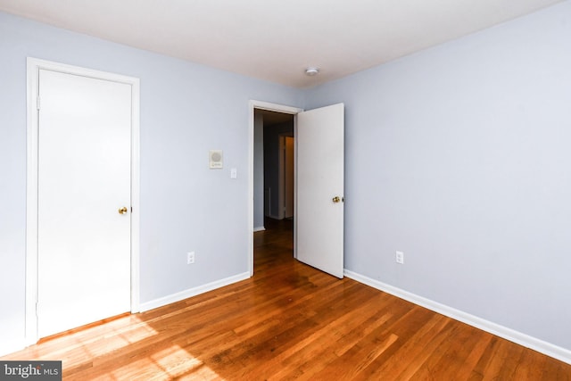 10903 Exeter Ct, Upper Marlboro, MD 20774 - unfurnished bedroom featuring wood finished floors and baseboards