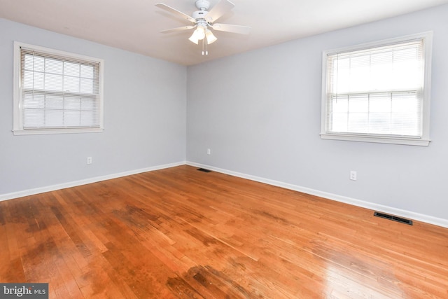 10903 Exeter Ct, Upper Marlboro, MD 20774 - spare room with wood-type flooring, baseboards, and a ceiling fan