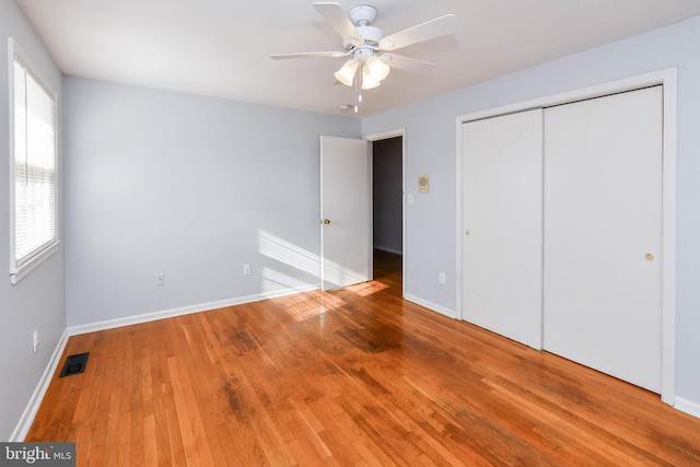 10903 Exeter Ct, Upper Marlboro, MD 20774 - unfurnished bedroom featuring wood finished floors, baseboards, a closet, and ceiling fan