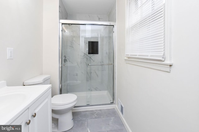 10903 Exeter Ct, Upper Marlboro, MD 20774 - bathroom with a marble finish shower, toilet, vanity, and baseboards