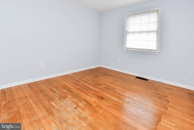 10903 Exeter Ct, Upper Marlboro, MD 20774 - empty room with baseboards and light wood finished floors