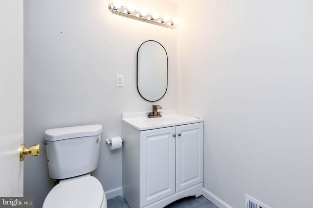 10903 Exeter Ct, Upper Marlboro, MD 20774 - bathroom with toilet, vanity, tile patterned flooring, and baseboards
