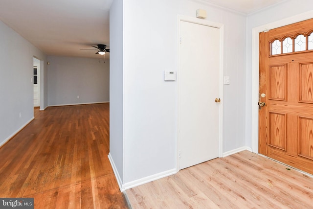10903 Exeter Ct, Upper Marlboro, MD 20774 - entrance foyer featuring wood finished floors, ceiling fan, baseboards, and crown molding