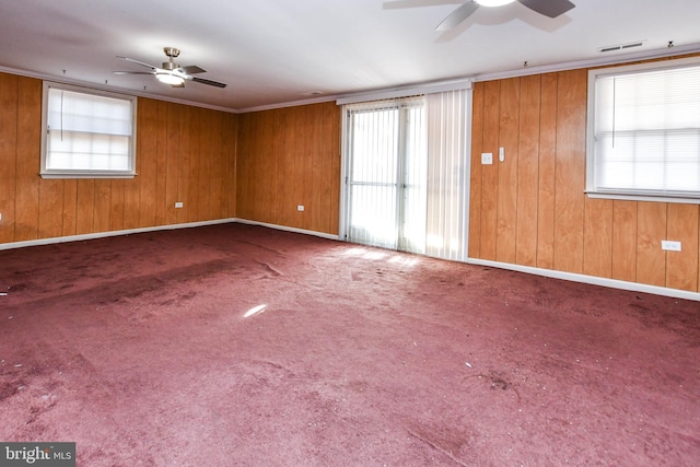 10903 Exeter Ct, Upper Marlboro, MD 20774 - carpeted spare room featuring ceiling fan, healthy amount of natural light, wooden walls, baseboards, and crown molding