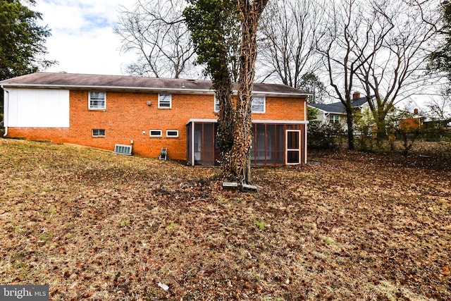 10903 Exeter Ct, Upper Marlboro, MD 20774 - rear view of property with brick siding, a sunroom, and cooling unit