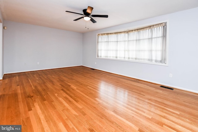 10903 Exeter Ct, Upper Marlboro, MD 20774 - unfurnished room with wood finished floors, baseboards, and ceiling fan