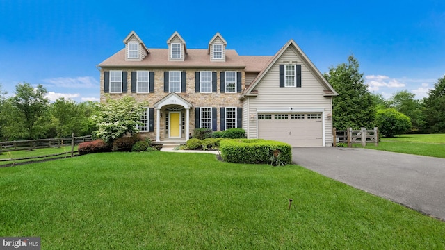 103 Equestrian Ct, Warrington, PA 18976 - view of front of home featuring asphalt driveway, stone siding, and an attached garage