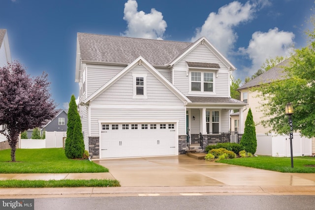 4005 Sweet Azalea Row, Glen Allen, VA 23059 - craftsman-style house featuring a porch, driveway, a garage, stone siding, and a shingled roof