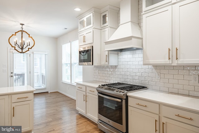 4005 Sweet Azalea Row, Glen Allen, VA 23059 - kitchen with appliances with stainless steel finishes, custom range hood, light countertops, a chandelier, and recessed lighting