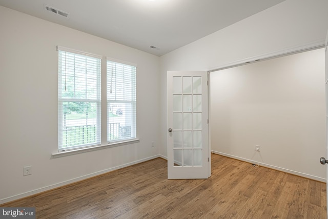 4005 Sweet Azalea Row, Glen Allen, VA 23059 - unfurnished room featuring wood finished floors, vaulted ceiling, french doors, and baseboards