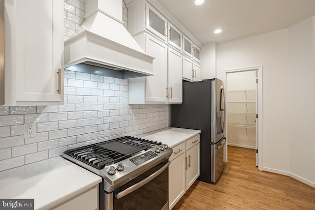 4005 Sweet Azalea Row, Glen Allen, VA 23059 - kitchen with appliances with stainless steel finishes, custom range hood, white cabinetry, light countertops, and light wood finished floors
