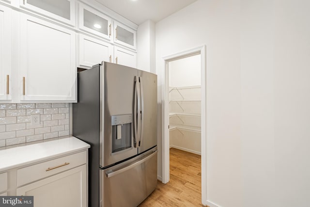 4005 Sweet Azalea Row, Glen Allen, VA 23059 - kitchen featuring stainless steel fridge with ice dispenser, light wood-style flooring, backsplash, white cabinetry, and light countertops