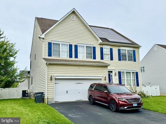 116 Meadow Brook Way, Centreville, MD 21617 - view of front facade featuring asphalt driveway, solar panels, a garage, and central air condition unit