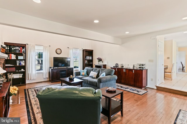 5512 Aspen Dale Ct, Ellicott City, MD 21043 - living area featuring light wood finished floors and recessed lighting