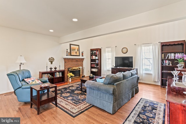 5512 Aspen Dale Ct, Ellicott City, MD 21043 - living area featuring light wood-style floors, a brick fireplace, and recessed lighting