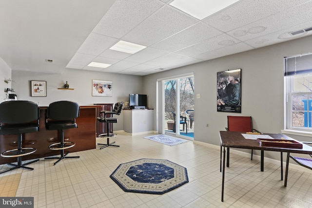 5512 Aspen Dale Ct, Ellicott City, MD 21043 - home office with healthy amount of natural light, a drop ceiling, and baseboards