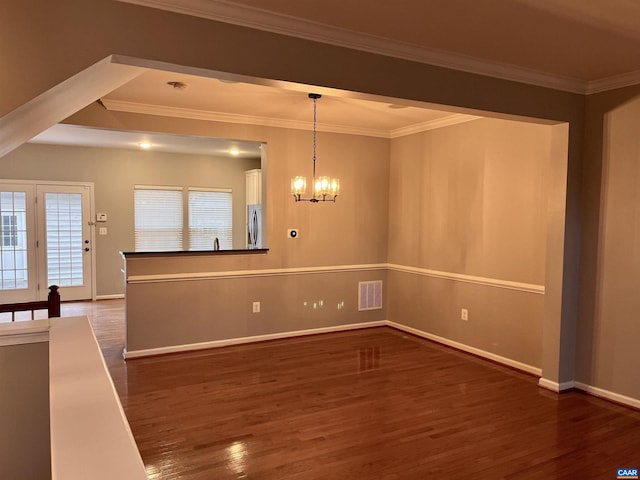 2733 Aldersgate Way, Charlottesville, VA 22911 - unfurnished dining area with a chandelier, dark wood-style floors, crown molding, and baseboards