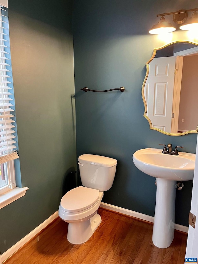 2733 Aldersgate Way, Charlottesville, VA 22911 - bathroom with toilet, wood finished floors, and baseboards