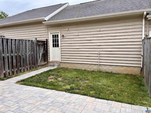 2733 Aldersgate Way, Charlottesville, VA 22911 - rear view of property featuring a shingled roof and a patio area