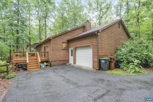6 Axle Tree Rd, Palmyra, VA 22963 - view of home's exterior featuring a chimney, a deck, an attached garage, crawl space, and driveway