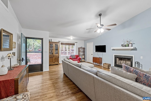 6 Axle Tree Rd, Palmyra, VA 22963 - living area with light wood finished floors, a ceiling fan, vaulted ceiling, and a fireplace