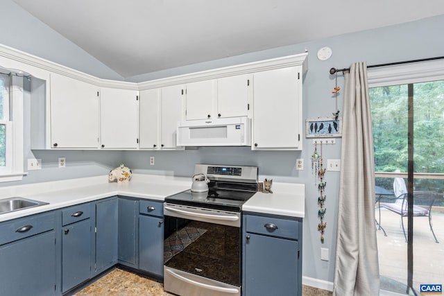6 Axle Tree Rd, Palmyra, VA 22963 - kitchen with white microwave, stainless steel electric range, lofted ceiling, light countertops, and blue cabinets