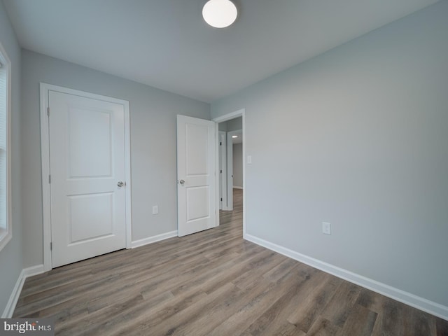 625 Butler Ave, Winchester, VA 22601 - unfurnished bedroom featuring wood finished floors and baseboards