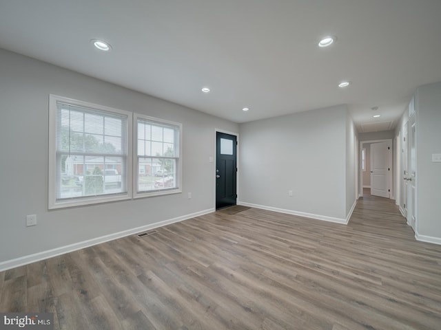 625 Butler Ave, Winchester, VA 22601 - unfurnished living room featuring wood finished floors, attic access, recessed lighting, and baseboards