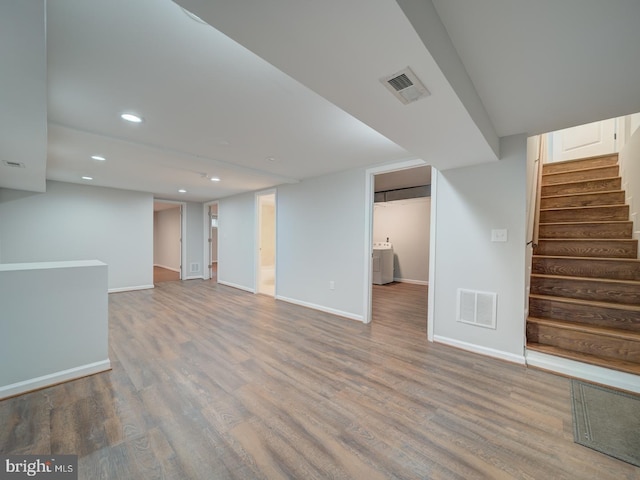 625 Butler Ave, Winchester, VA 22601 - finished basement featuring washer / dryer, wood finished floors, recessed lighting, stairs, and baseboards