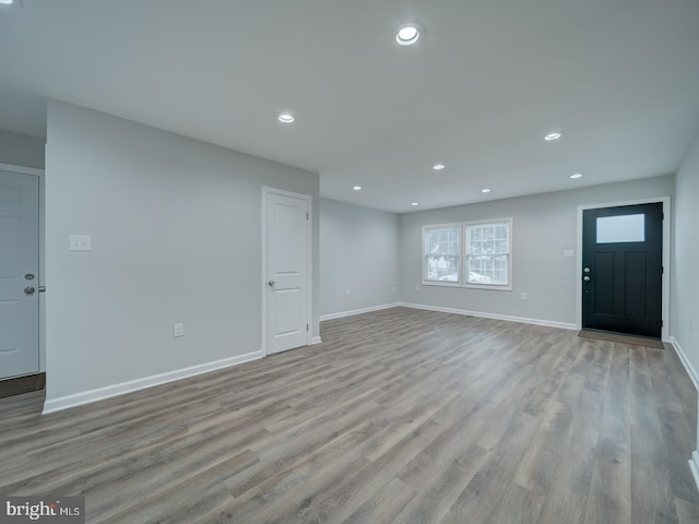 625 Butler Ave, Winchester, VA 22601 - unfurnished living room with recessed lighting, baseboards, and wood finished floors