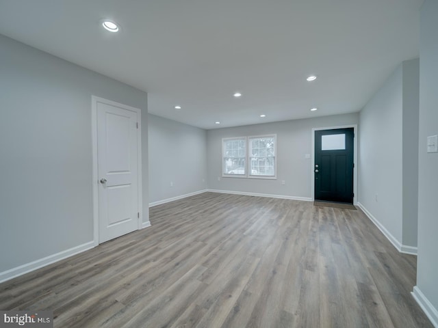 625 Butler Ave, Winchester, VA 22601 - unfurnished living room featuring wood finished floors, baseboards, and recessed lighting