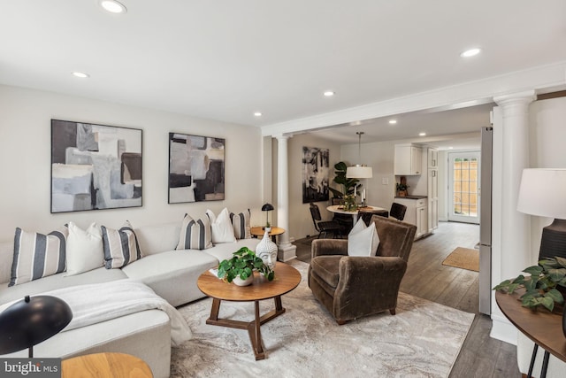 106 Bainbridge St, Philadelphia, PA 19147 - living room featuring decorative columns, wood finished floors, and recessed lighting