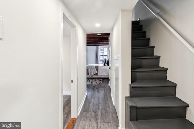 106 Bainbridge St, Philadelphia, PA 19147 - stairs featuring wood finished floors, baseboards, and recessed lighting