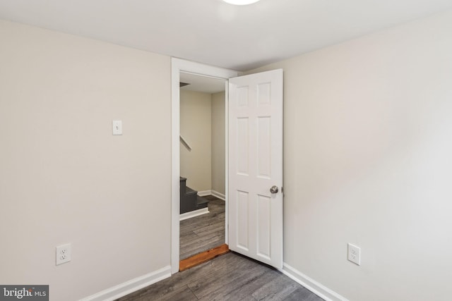 106 Bainbridge St, Philadelphia, PA 19147 - unfurnished room featuring dark wood-style floors, baseboards, and stairs