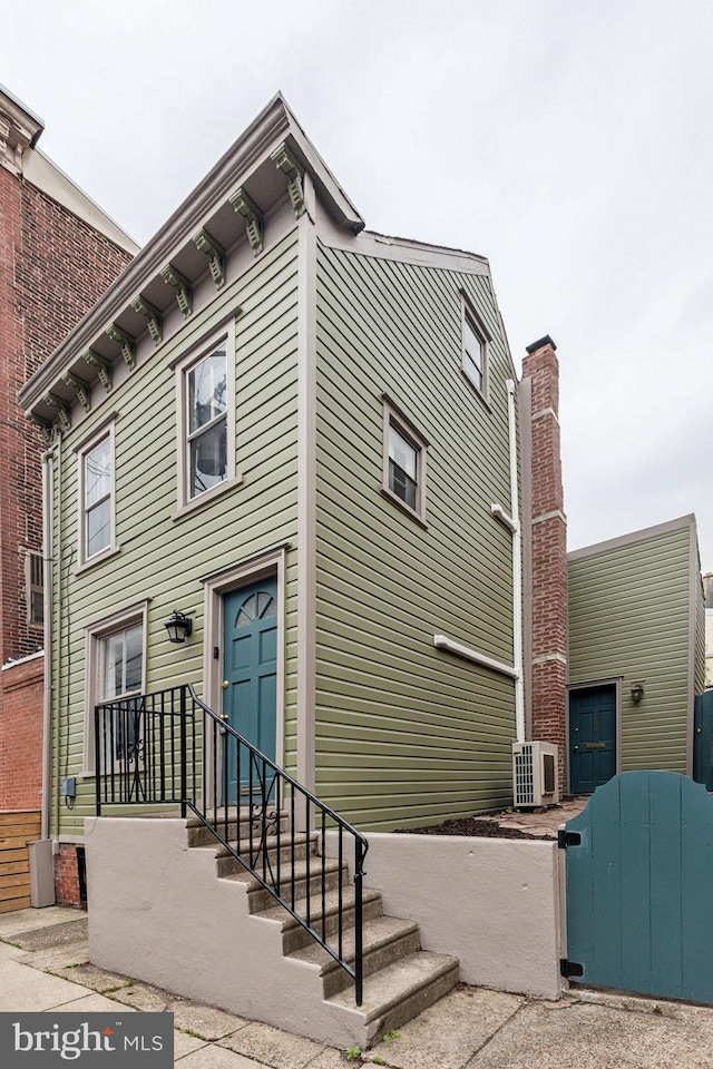 106 Bainbridge St, Philadelphia, PA 19147 - view of side of home featuring a cooling unit