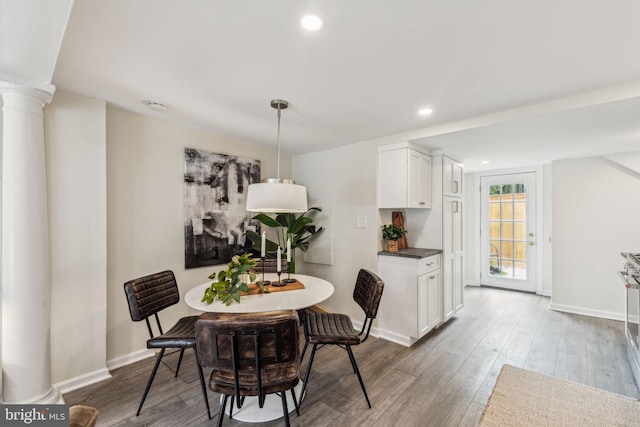 106 Bainbridge St, Philadelphia, PA 19147 - dining area with wood finished floors, baseboards, recessed lighting, and ornate columns