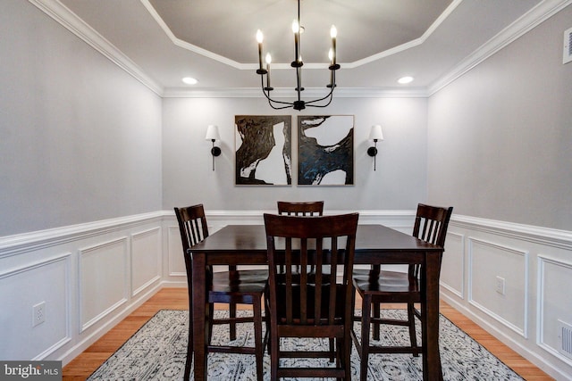 812 Red Rock Cir, Royersford, PA 19468 - dining room featuring light wood finished floors, a chandelier, a decorative wall, recessed lighting, and a wainscoted wall
