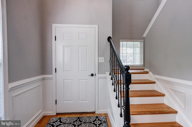 812 Red Rock Cir, Royersford, PA 19468 - stairs with wood finished floors, wainscoting, and a decorative wall