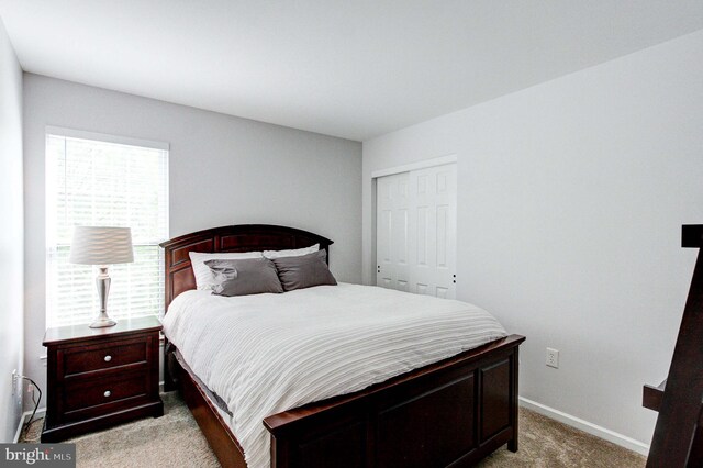 812 Red Rock Cir, Royersford, PA 19468 - bedroom with light carpet, a closet, and baseboards