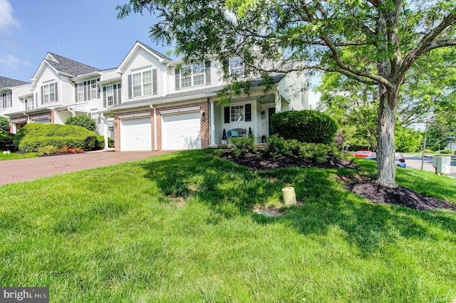 812 Red Rock Cir, Royersford, PA 19468 - view of front of property featuring driveway, an attached garage, a front yard, and brick siding