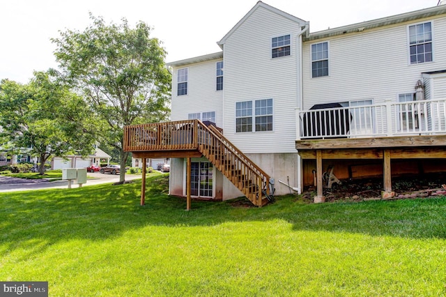 812 Red Rock Cir, Royersford, PA 19468 - rear view of house with a wooden deck, stairs, and a yard