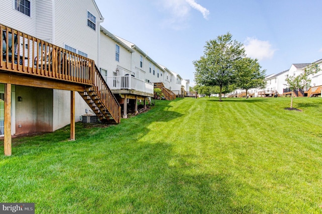 812 Red Rock Cir, Royersford, PA 19468 - view of green lawn featuring stairway, a wooden deck, a residential view, and central air condition unit