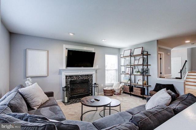812 Red Rock Cir, Royersford, PA 19468 - living area with a fireplace, stairway, recessed lighting, and light carpet
