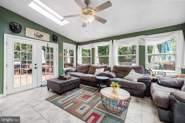 312 Walnut Ave, Marlton, NJ 08053 - living room featuring lofted ceiling, light tile patterned floors, french doors, a ceiling fan, and a skylight