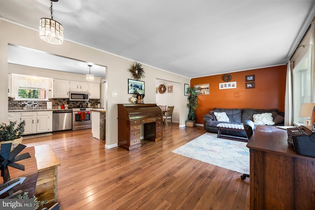 312 Walnut Ave, Marlton, NJ 08053 - living area featuring ornamental molding, light wood-style floors, and baseboards