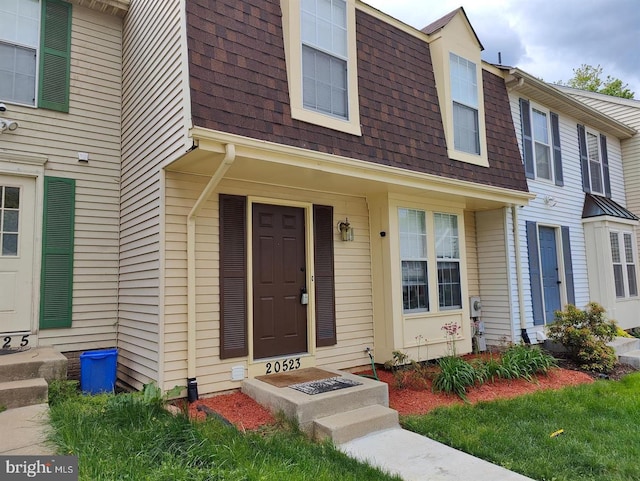 20523 Staffordshire Dr, Germantown, MD 20874 - view of exterior entry with roof with shingles