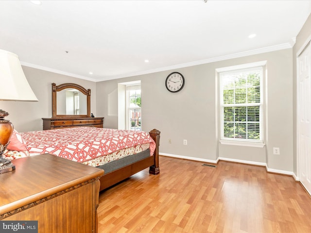 20523 Staffordshire Dr, Germantown, MD 20874 - bedroom with multiple windows, light wood finished floors, baseboards, crown molding, and recessed lighting