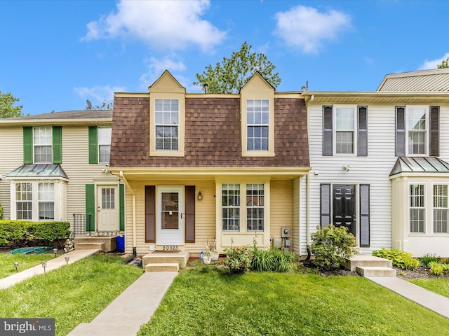 20523 Staffordshire Dr, Germantown, MD 20874 - townhome / multi-family property featuring a front lawn and a shingled roof