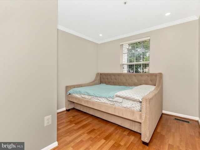 20523 Staffordshire Dr, Germantown, MD 20874 - bedroom featuring baseboards, ornamental molding, wood finished floors, and recessed lighting